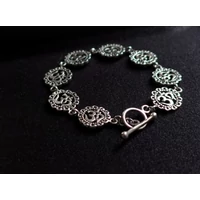 Ezüst OM karkötő 17 gr.